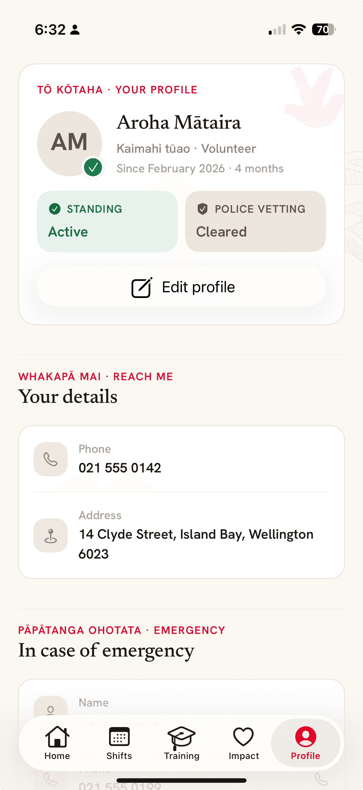 The Profile screen, showing active standing, cleared police vetting and contact details
